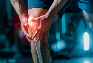 Laser for Knee Pain - Copyright – Stock Photo / Register Mark